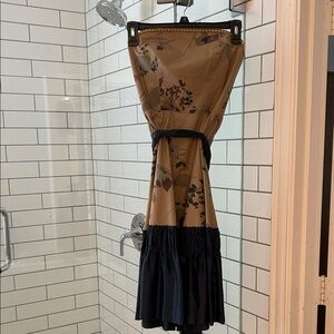 Tabitha Tan and Black Floral Dress